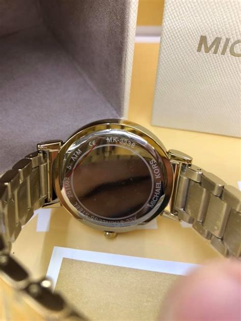 where is the serial number on my michael kors watch|michael kors style number lookup.